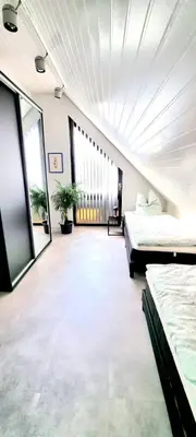 Ein Bett oder Betten in einem Zimmer der Unterkunft Charmantes Haus mit Gartenoase