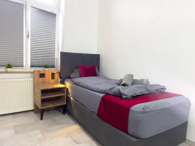 Ein Bett oder Betten in einem Zimmer der Unterkunft Serviceroom24 - Apartment 6 in Recklinghausen Hoch WLAN - Smart-TV - 24-7 Check-in und Küche