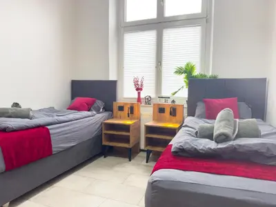 Ein Bett oder Betten in einem Zimmer der Unterkunft Serviceroom24 - Apartment 6 in Recklinghausen Hoch WLAN - Smart-TV - 24-7 Check-in und Küche