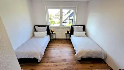 Ein Bett oder Betten in einem Zimmer der Unterkunft Harpener Hellweg 457
