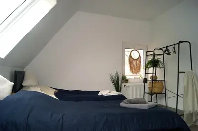 Ein Bett oder Betten in einem Zimmer der Unterkunft Monteurswohnung - Duisburg - 5 Personen