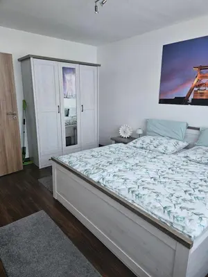 Ein Bett oder Betten in einem Zimmer der Unterkunft FeWo Ruhrpott