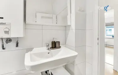 Ein Badezimmer in der Unterkunft BEGE APARTMENTS CompanyLife