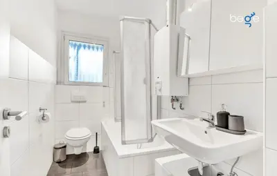 Ein Badezimmer in der Unterkunft BEGE APARTMENTS CompanyLife
