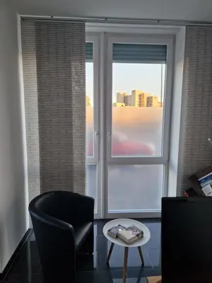 Ein Sitzbereich in der Unterkunft Zentrales City-Apartment mit Garage und Arbeitsplatz geeignet für Business und Familie