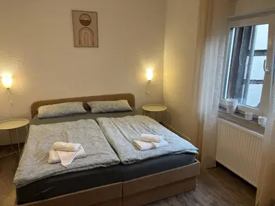 Ein Bett oder Betten in einem Zimmer der Unterkunft Große 100qm Wohnung für 6 Personen in der Altstadt