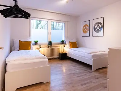 Ein Bett oder Betten in einem Zimmer der Unterkunft BudgetRoom Workers Home