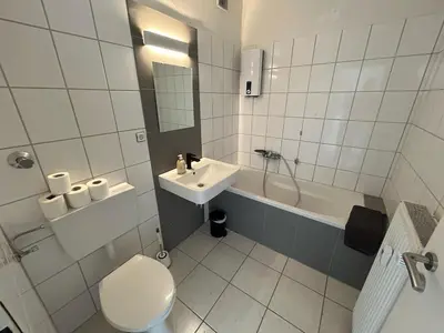 Ein Badezimmer in der Unterkunft Monteurswohnung - Dorsten - 6 Personen