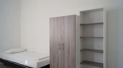 Ein Bett oder Betten in einem Zimmer der Unterkunft DIM Monteurzimmer Duisburg