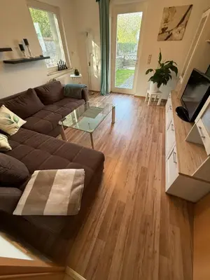 Ein Sitzbereich in der Unterkunft Wohnen am Reiterhof, 50 qm, mit Gartennutzung