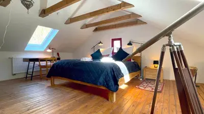 Ein Bett oder Betten in einem Zimmer der Unterkunft Das Rubinhaus für Dich allein!