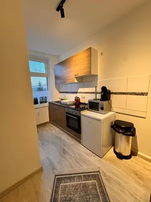 Küche/Küchenzeile in der Unterkunft A&V Apartments Tiger Nähe Stadion