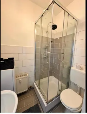 Ein Badezimmer in der Unterkunft A&V Apartments Tiger Nähe Stadion