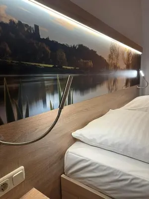 Ein Bett oder Betten in einem Zimmer der Unterkunft Haven Hotels - Bochum