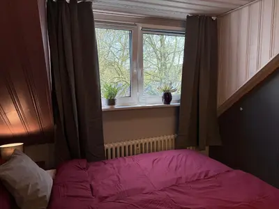 Ein Bett oder Betten in einem Zimmer der Unterkunft Lichtblick 2