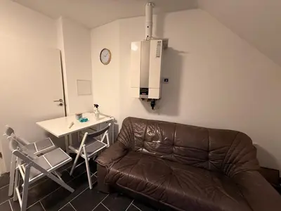 Ein Sitzbereich in der Unterkunft Apartment Wuppertal 4P Küche