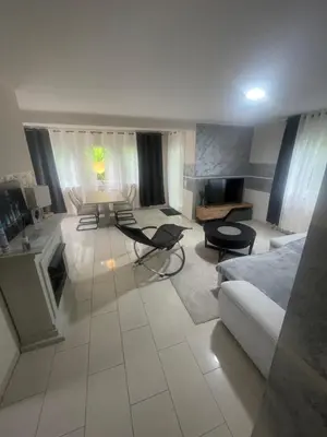 Ein Sitzbereich in der Unterkunft Nußberg Apartments Iserlohn