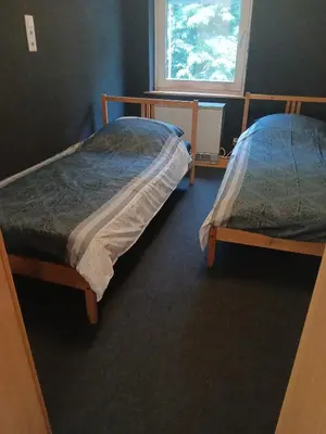 Ein Bett oder Betten in einem Zimmer der Unterkunft Monteurwohnung Fekete