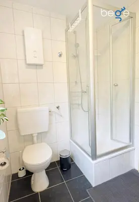 Ein Badezimmer in der Unterkunft BEGE APARTMENTS Team Base
