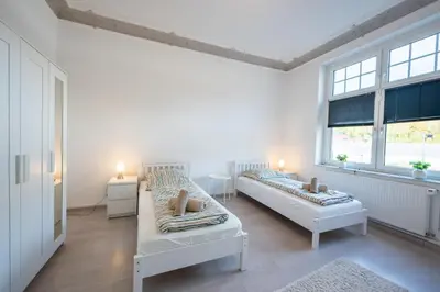Ein Bett oder Betten in einem Zimmer der Unterkunft HagenStay Eilpe 1