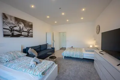 Ein Bett oder Betten in einem Zimmer der Unterkunft HagenStay Eilpe 1