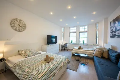 Ein Bett oder Betten in einem Zimmer der Unterkunft HagenStay Eilpe 1