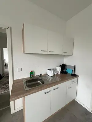 Küche/Küchenzeile in der Unterkunft Wohnung 8P Zentral Lüdenscheid