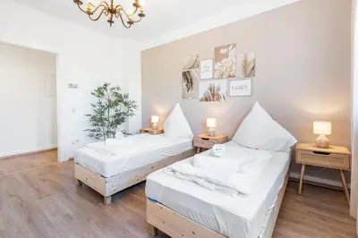 Ein Bett oder Betten in einem Zimmer der Unterkunft JAKSE-Apartments - Bochum Work & Relax - Top Anbindung & Parkplätze