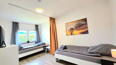 Ein Bett oder Betten in einem Zimmer der Unterkunft Modern 3-Room Apartment with Balcony & Free Parking & Free Wi-Fi in Hagen - HL01