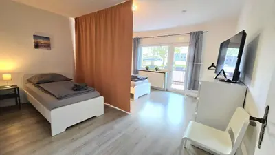 TV/Unterhaltungsangebot in der Unterkunft Modern 3-Room Apartment with Balcony & Free Parking & Free Wi-Fi in Hagen - HL01