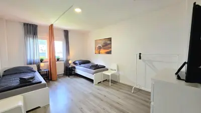 Ein Bett oder Betten in einem Zimmer der Unterkunft Modern 3-Room Apartment with Balcony & Free Parking & Free Wi-Fi in Hagen - HL01