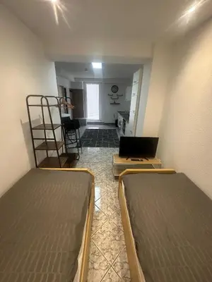 Ein Bett oder Betten in einem Zimmer der Unterkunft Ferienwohnung nähe Universität