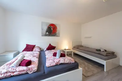 Ein Bett oder Betten in einem Zimmer der Unterkunft HagenStay Mittelstadt 2