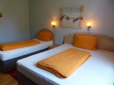 Ein Bett oder Betten in einem Zimmer der Unterkunft Haus der Gastlichkeit