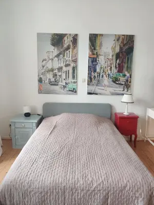 Ein Bett oder Betten in einem Zimmer der Unterkunft LöwenTAL Wohnen an der Ruhr