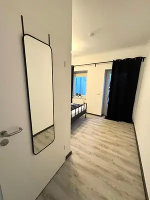 Ein Bett oder Betten in einem Zimmer der Unterkunft E&S Apartments