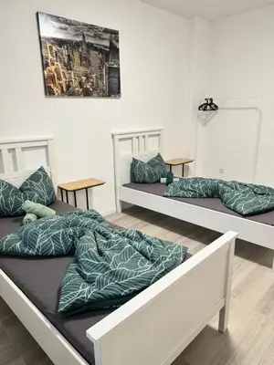Ein Bett oder Betten in einem Zimmer der Unterkunft Stilvolles Apartment Royal Zentral Ruhig & Parkplatz inkl