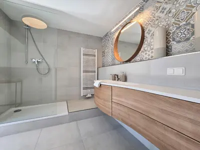 Ein Badezimmer in der Unterkunft Alpha Apartments