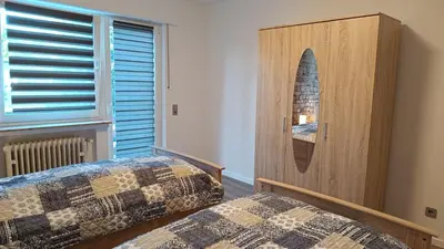 Ein Bett oder Betten in einem Zimmer der Unterkunft FeWo Marjenza