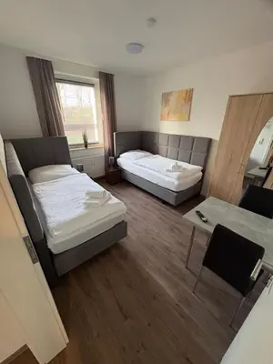 Ein Bett oder Betten in einem Zimmer der Unterkunft Ferienwohnung Evelyn