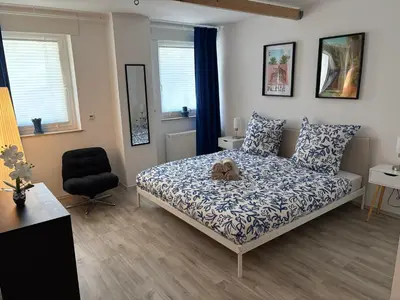 Ein Bett oder Betten in einem Zimmer der Unterkunft Die Giraffe
