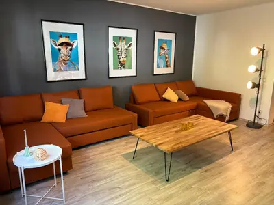 Ein Sitzbereich in der Unterkunft Die Giraffe