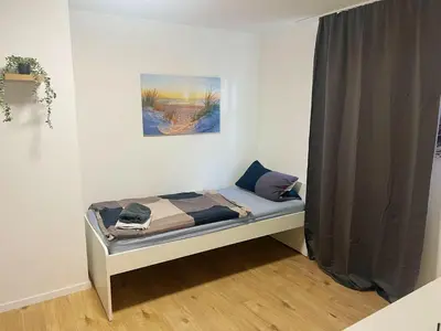 Ein Bett oder Betten in einem Zimmer der Unterkunft Zeitwohnen in Hückeswagen -Neu-