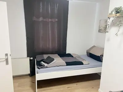 Ein Bett oder Betten in einem Zimmer der Unterkunft Zeitwohnen in Hückeswagen -Neu-