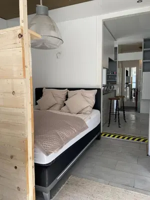 Ein Bett oder Betten in einem Zimmer der Unterkunft Studio Apartment im Herzen der Altstadt