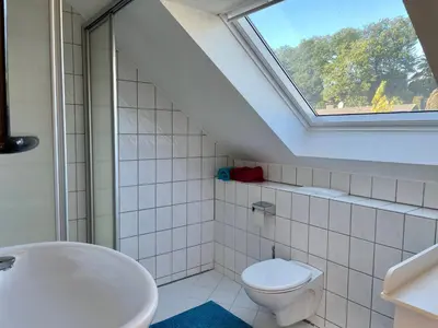 Ein Badezimmer in der Unterkunft Gemütliches Studio in ruhiger Lage mit Klimaanlage, Netflix und Parkplatz