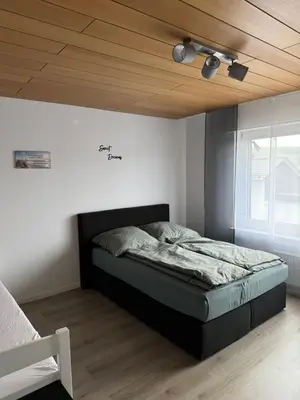 Ein Bett oder Betten in einem Zimmer der Unterkunft FeWo Flick