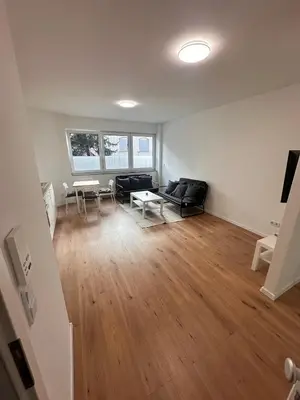 Ein Sitzbereich in der Unterkunft Frisch renovierte Wohnung