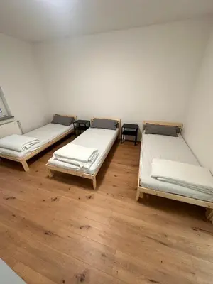 Ein Bett oder Betten in einem Zimmer der Unterkunft Frisch renovierte Wohnung