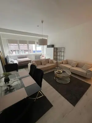 Ein Sitzbereich in der Unterkunft Modernes City Apartment am Limbecker Platz Essen